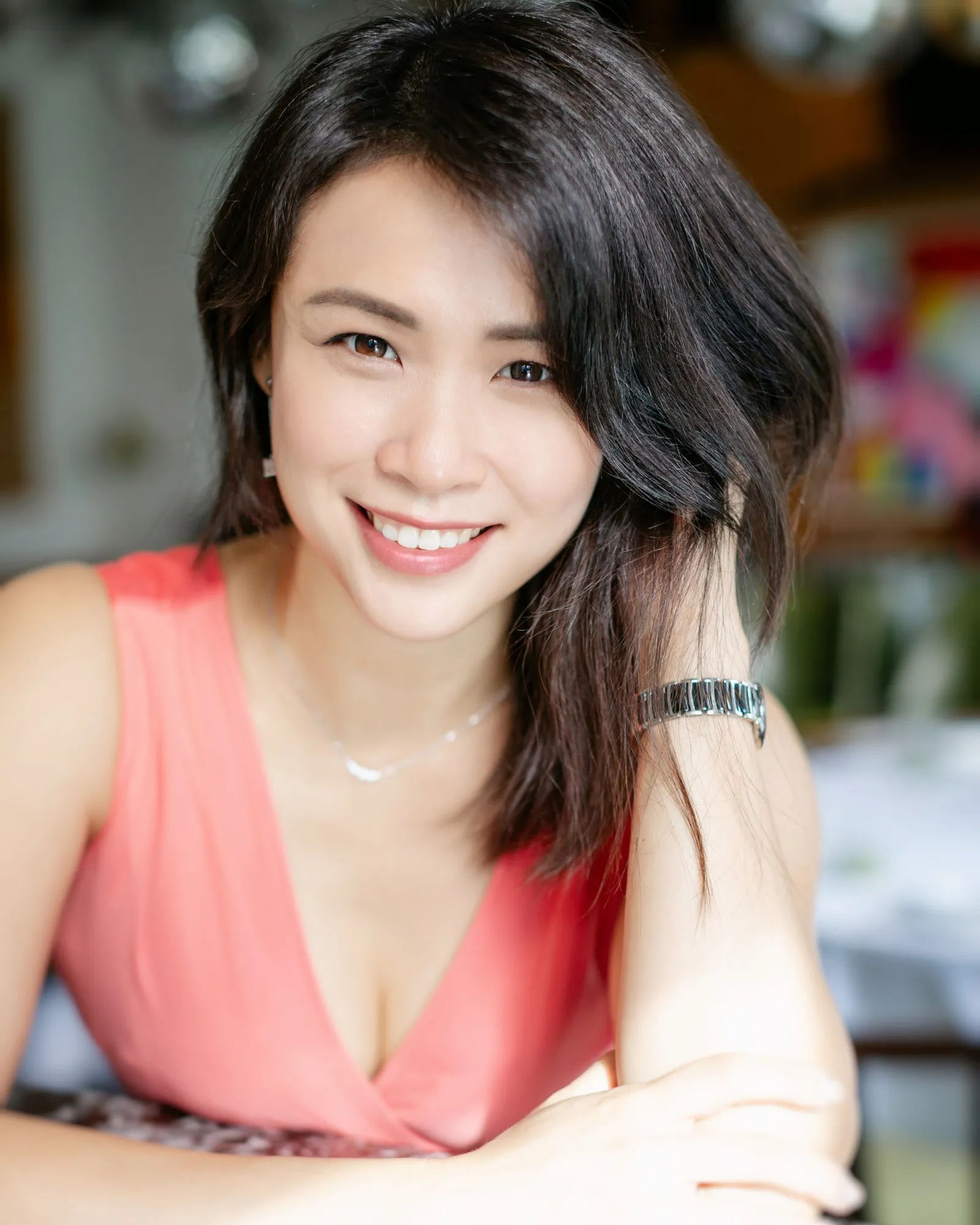 Michelle Lim, public speaking and communication coach, smiling warmly.
