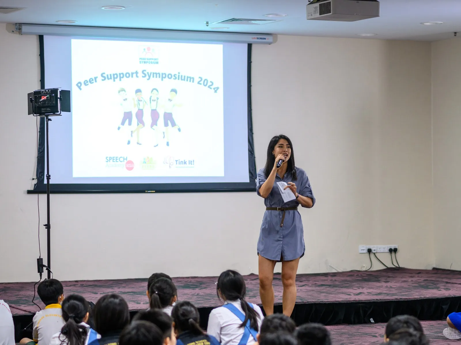 Michelle Lim speaking to students at the Peer Support Symposium 2024.